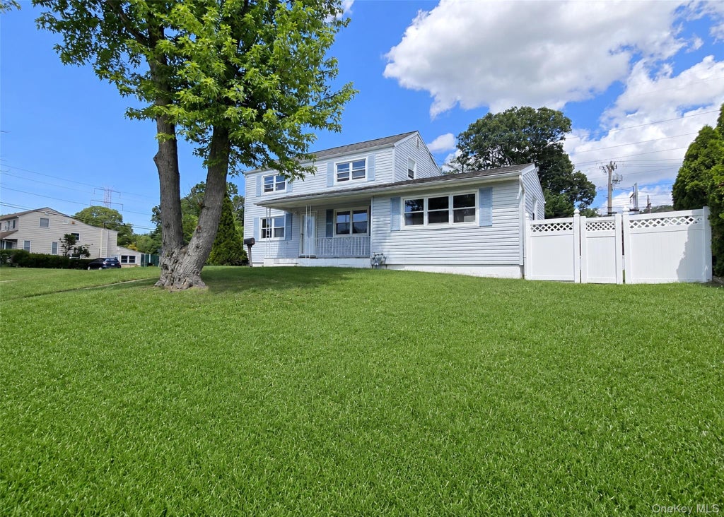 Photo of 290 Eastwood Boulevard, Centereach, NY 11720 (MLS # 1018799)