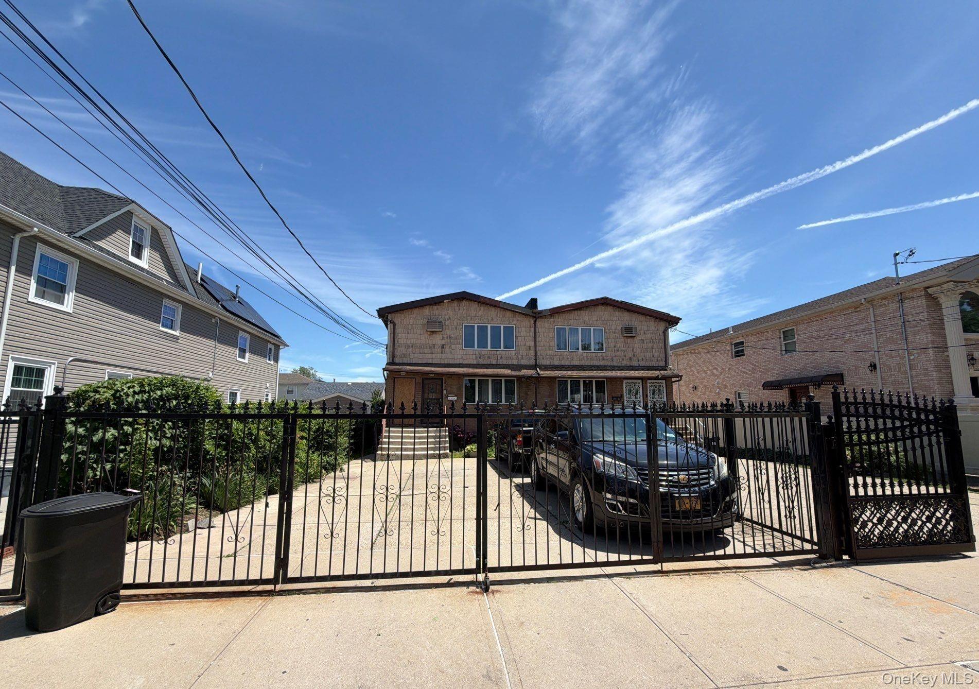 Photo 1 of 4 — 130-21 140th Street, Jamaica, NY 11436