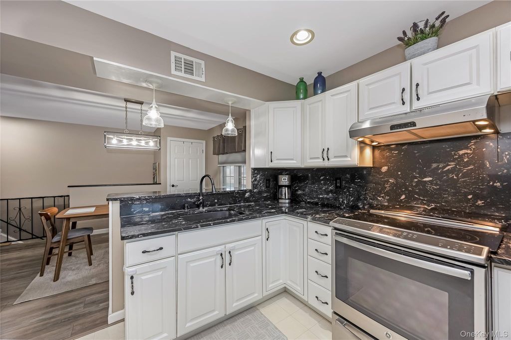 Photo of 140 Mariners Way, Copiague, NY 11726 (MLS # 987268)