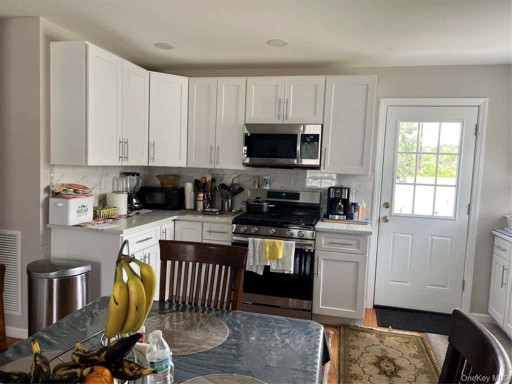 Photo of 445 Albany Avenue, Amityville, NY 11701 (MLS # 1039024)