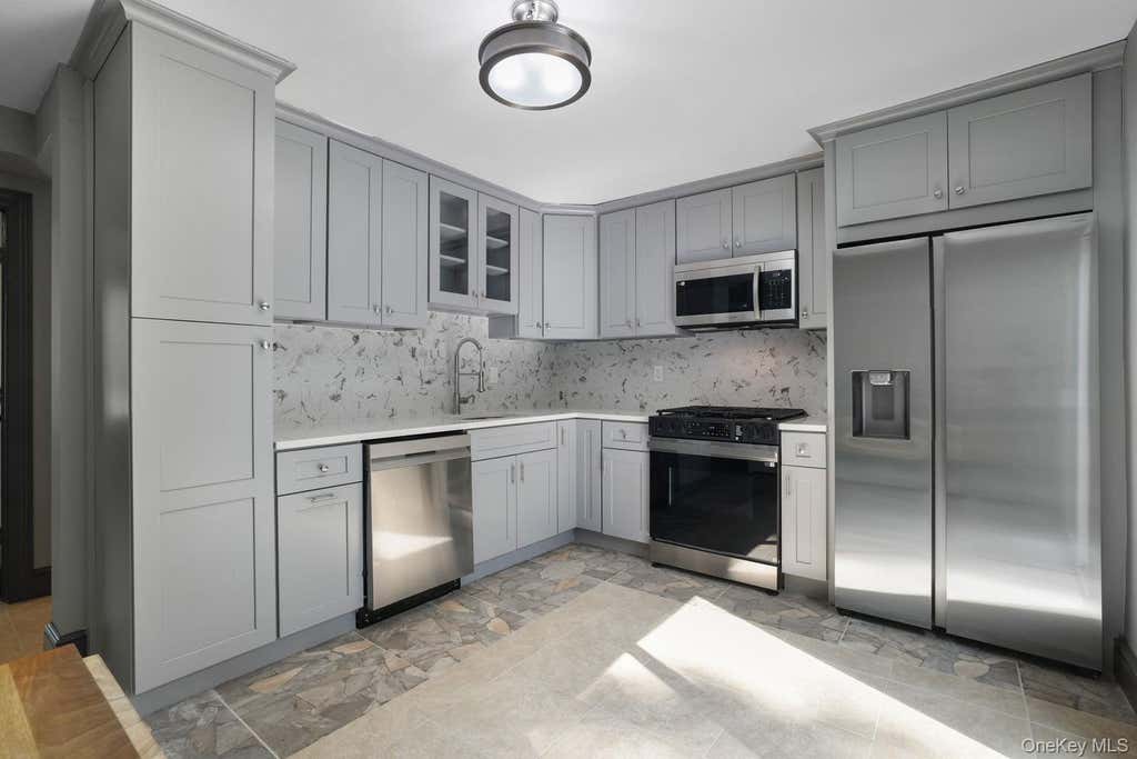 Photo of 99 Ontario Street, Port Jefferson Station, NY 11776 (MLS # 1043085)