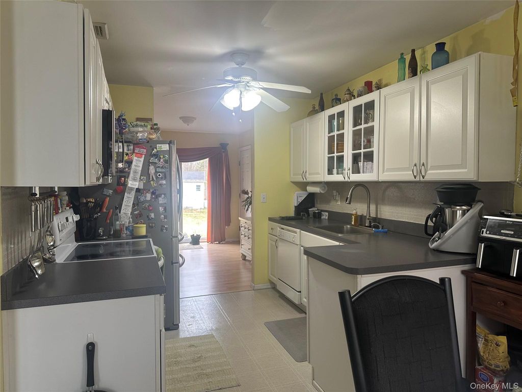 Photo of 3 Horseshoe Lane, Center Moriches, NY 11934 (MLS # 990841)