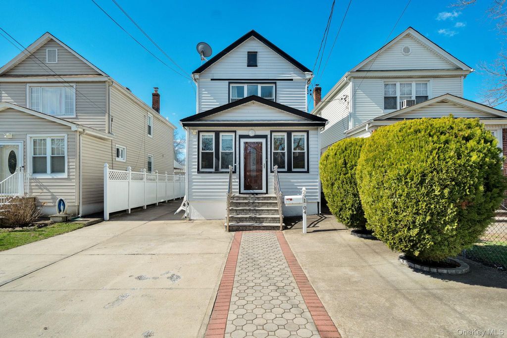 Photo of 91-04 218th Place, Queens Village, NY 11428 (MLS # 978495)