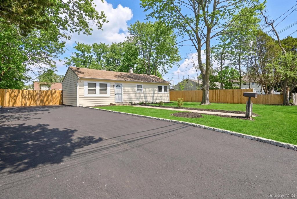 Photo of 25 Montgomery Street, Brentwood, NY 11717 (MLS # 985919)