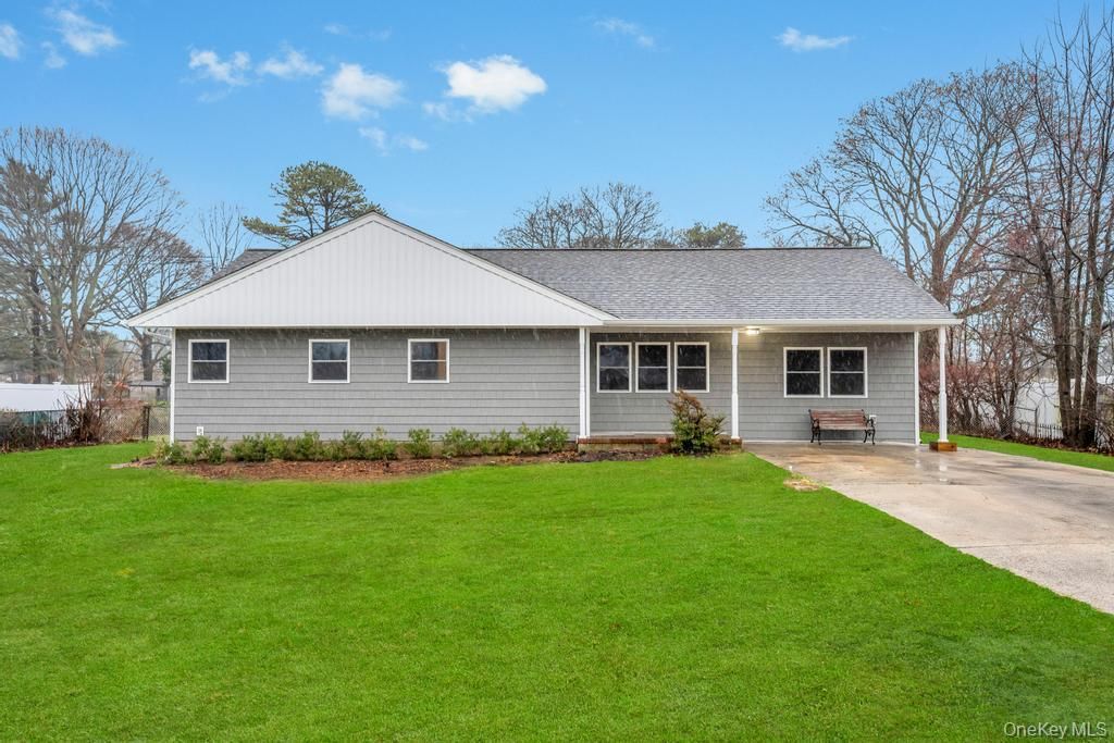 Photo of 16 Columbus Avenue, Brentwood, NY 11717 (MLS # 940764)