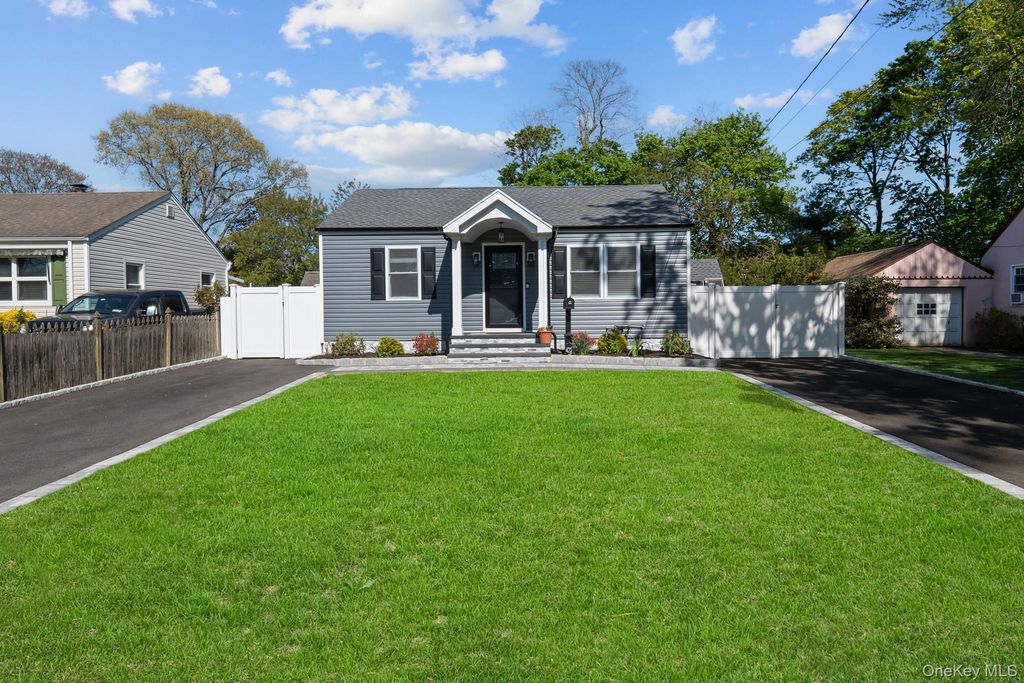 Photo of 9 Brook Place, East Islip, NY 11730 (MLS # 991654)