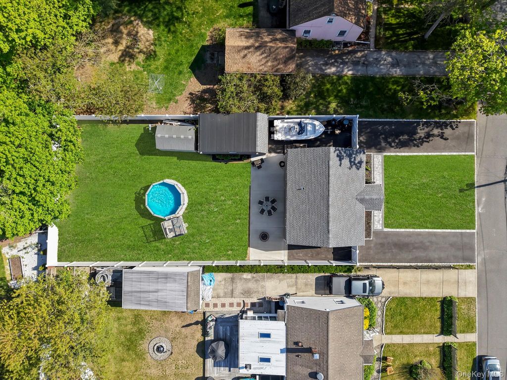 Photo of 9 Brook Place, East Islip, NY 11730 (MLS # 991654)