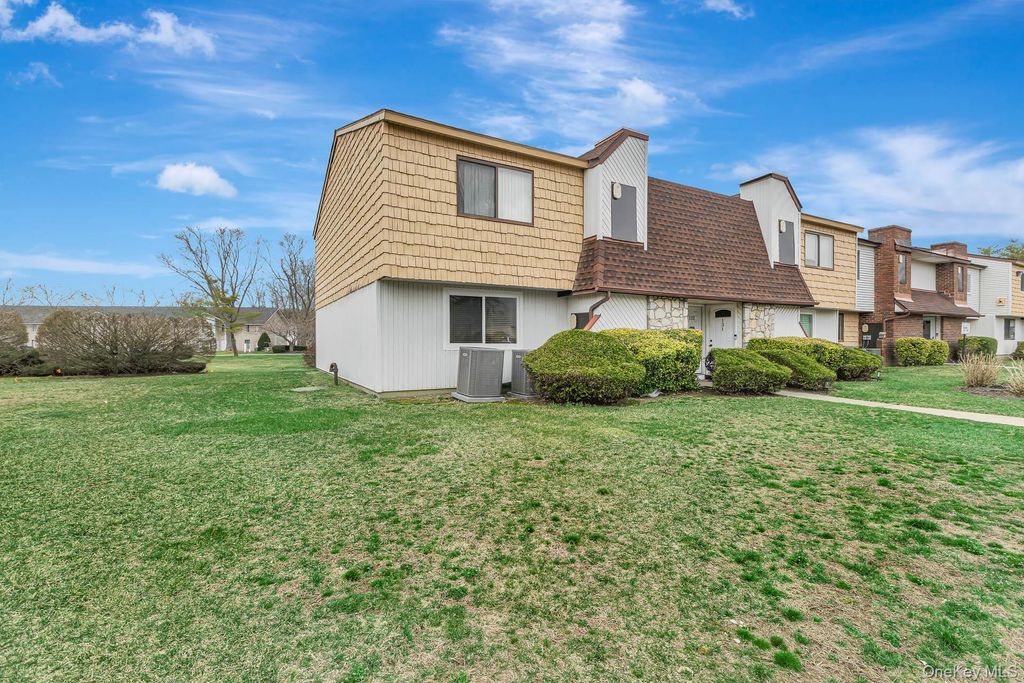 Photo of 129 Pointe Circle N #129, Coram, NY 11727 (MLS # 986304)