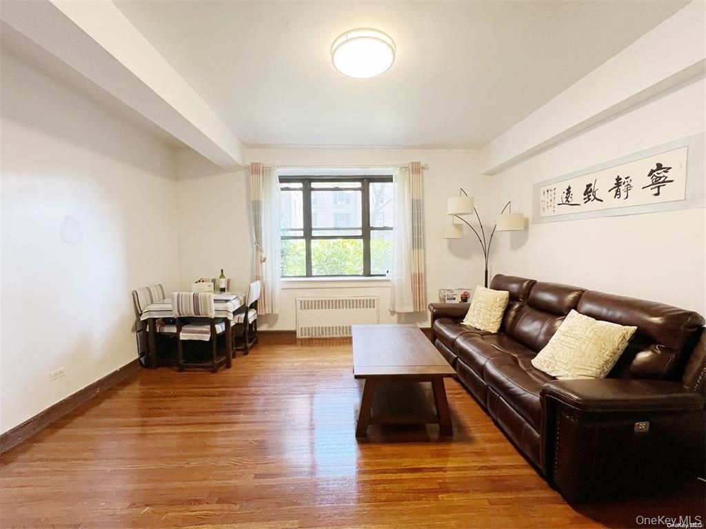 Photo of 11219 34th Avenue #F, Corona, NY 11368 (MLS # 965722)