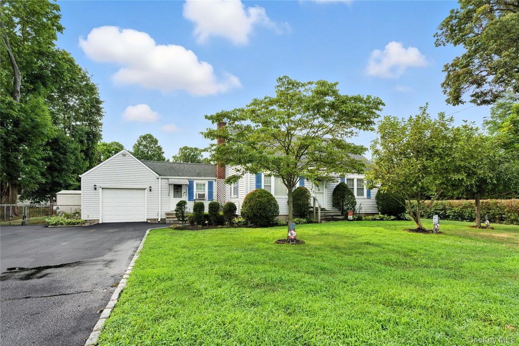 Photo of 1547 Walt Whitman Road, Melville, NY 11747 (MLS # 953942)