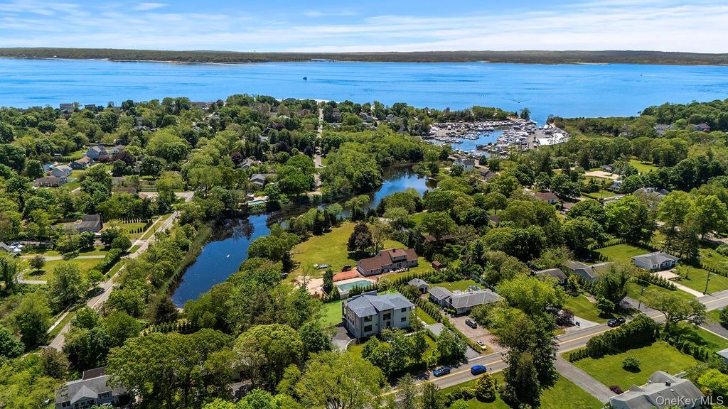 Photo of 1001 Peconic Bay Blvd Blvd, Jamesport, NY 11947 (MLS # 963444)