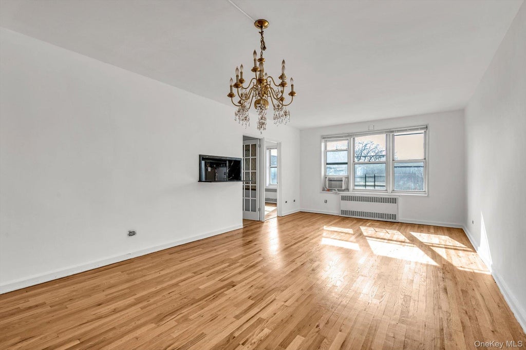 Photo of 79-10 34th Avenue #7W, Jackson Heights, NY 11372 (MLS # 1060995)