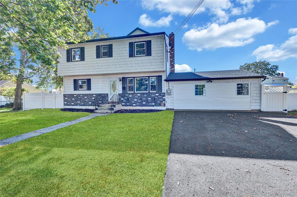 Photo of 90 30th Street, Copiague, NY 11726 (MLS # 928217)