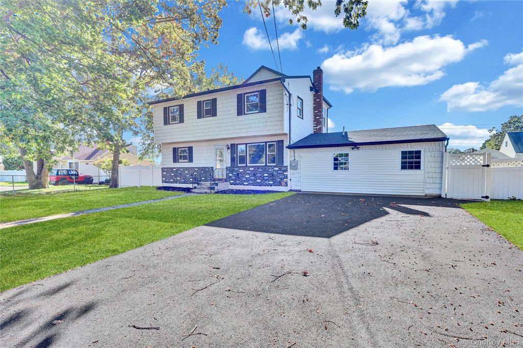 Photo of 90 30th Street, Copiague, NY 11726 (MLS # 928217)