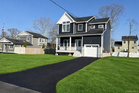 Photo of 7 Edgewater Drive, Mastic Beach, NY 11951 (MLS # 990557)