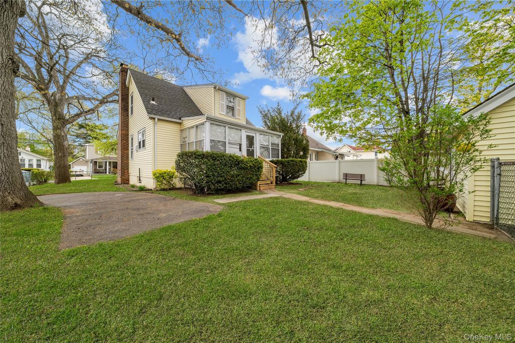 Photo of 21 Voshage Street, North Baldwin, NY 11510 (MLS # 993397)