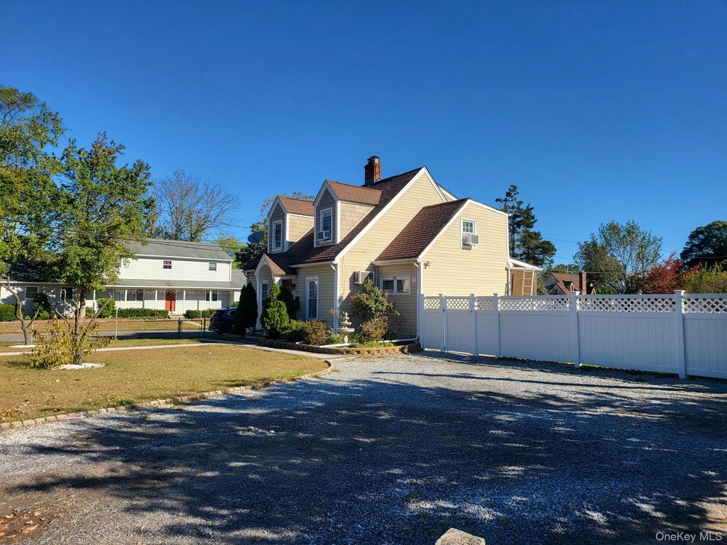 Photo of 61 Wheeler Road, Central Islip, NY 11722 (MLS # 922679)
