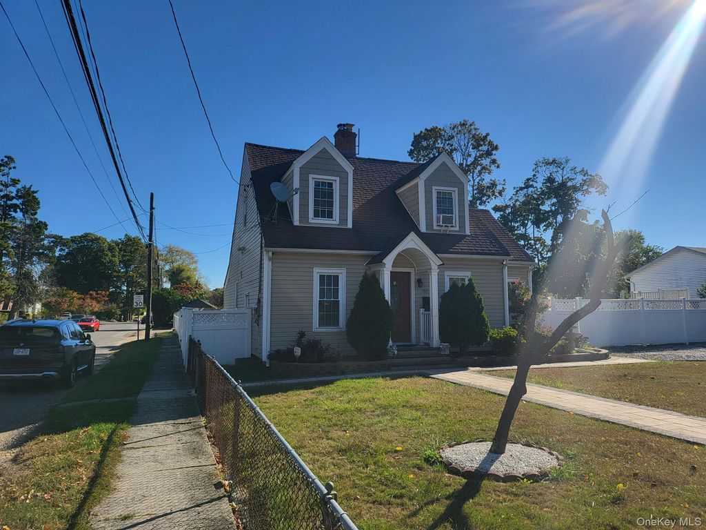 Photo of 61 Wheeler Road, Central Islip, NY 11722 (MLS # 922679)