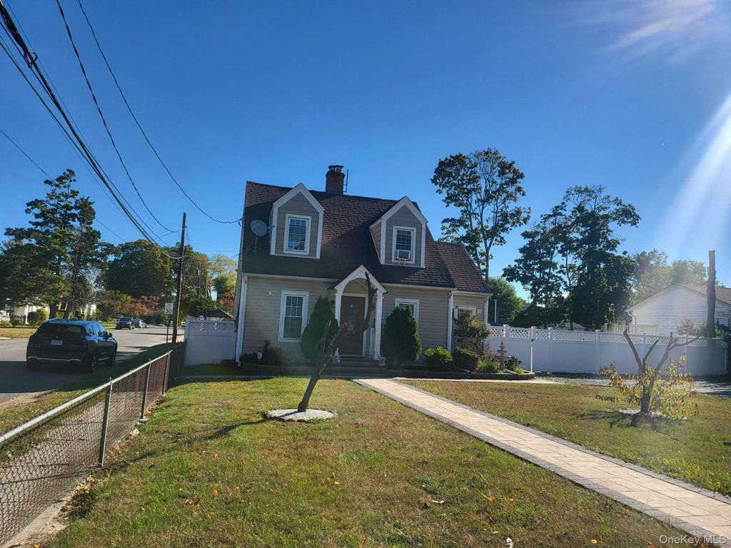 Photo of 61 Wheeler Road, Central Islip, NY 11722 (MLS # 922679)