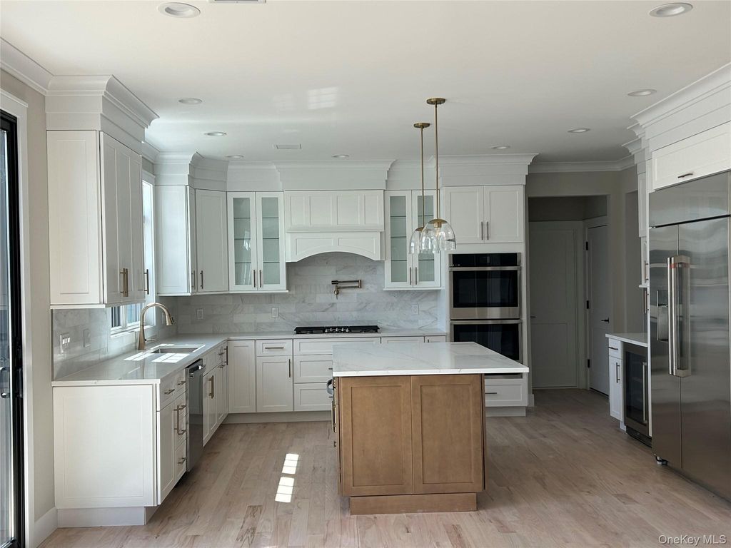 Photo of 119 Choir Lane, Westbury, NY 11590 (MLS # 975365)