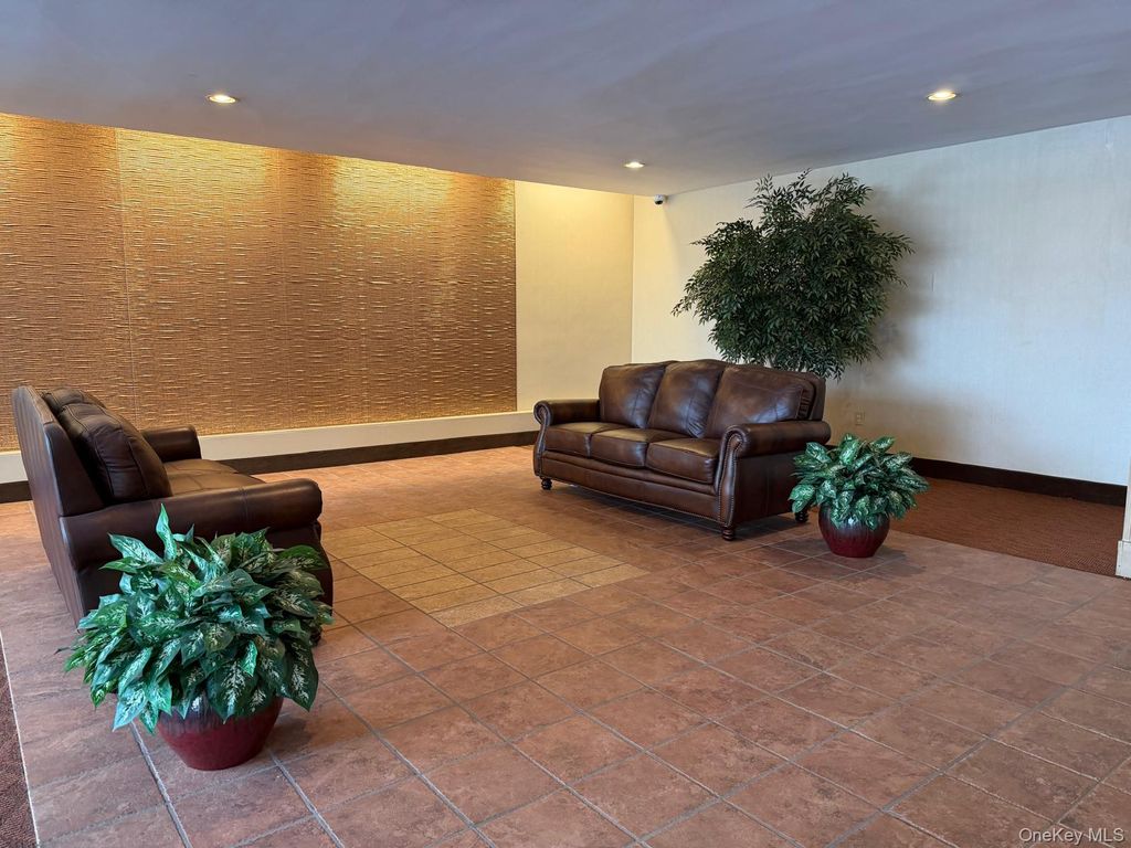 Photo of 490 Atlantic Avenue #115, East Rockaway, NY 11518 (MLS # 962040)