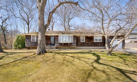 Photo of 52 Woodbury Road, Farmingville, NY 11738 (MLS # 982850)