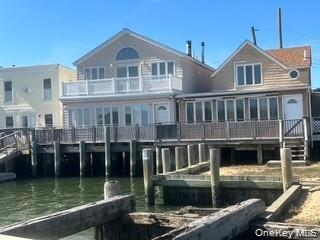 Photo of 14 W 5th Road, Broad Channel, NY 11693 (MLS # 1066968)