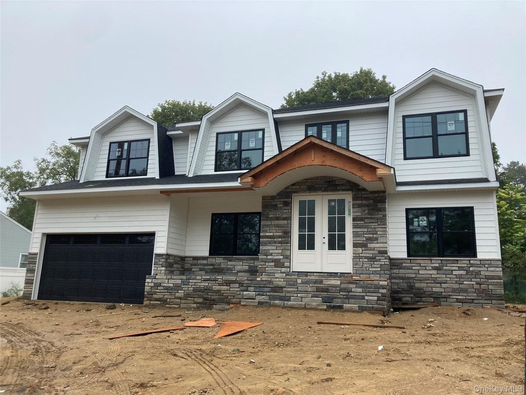Photo of 130 Syosset Woodbury Road, Syosset, NY 11791 (MLS # 907743)