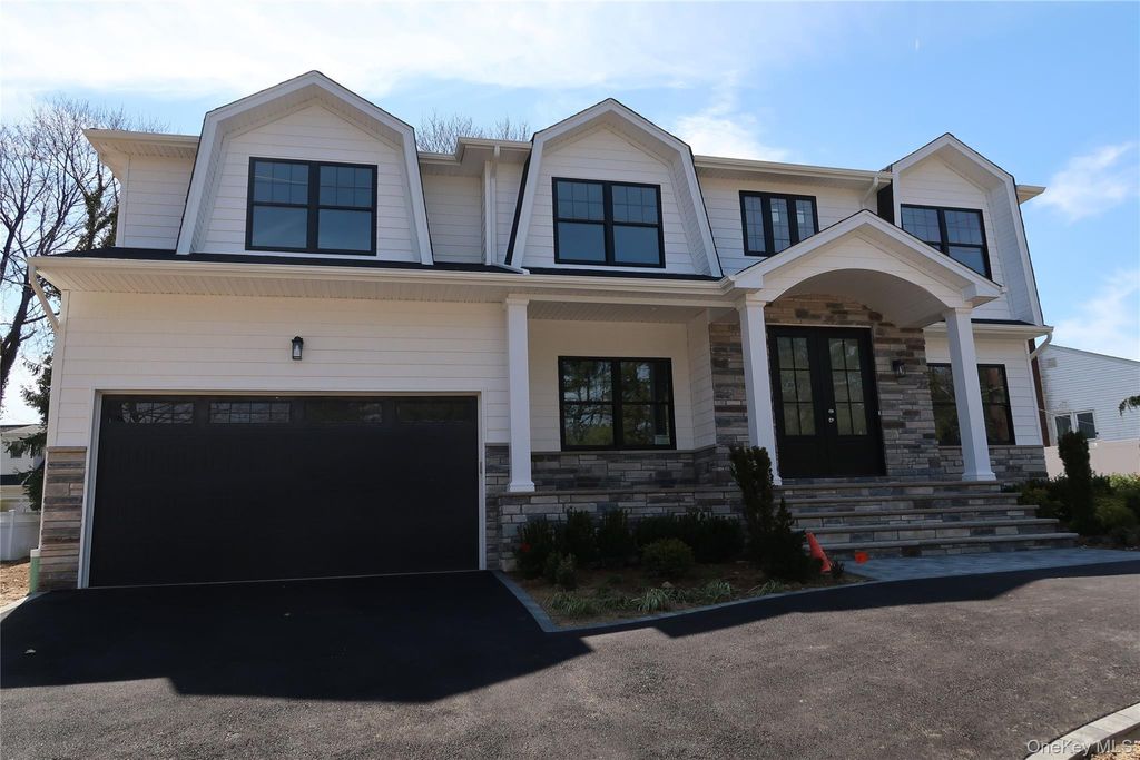 Photo of 130 Syosset Woodbury Road, Syosset, NY 11791 (MLS # 907743)