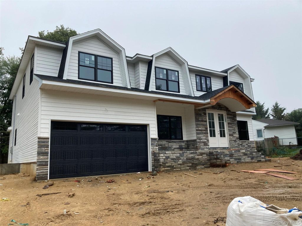 Photo of 130 Syosset Woodbury Road, Syosset, NY 11791 (MLS # 907743)