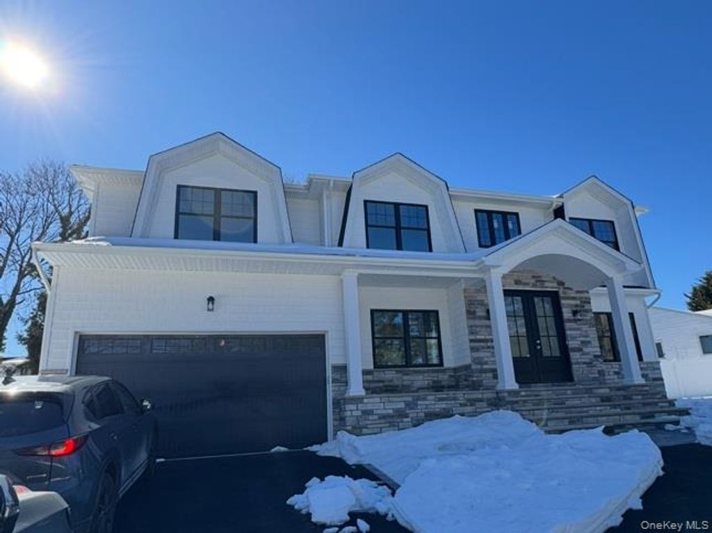 Photo of 130 Syosset Woodbury Road, Syosset, NY 11791 (MLS # 907743)