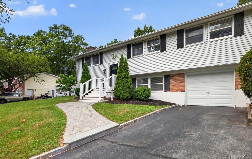 Photo of 42 W Broadway, Port Jefferson Station, NY 11776 (MLS # 1021664)