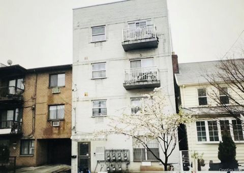 Photo of 5212 102ND Street, Corona, NY 11368 (MLS # 987147)