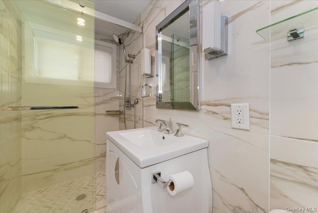 Photo of 504 Cedarwood Drive, Cedarhurst, NY 11516 (MLS # 943148)