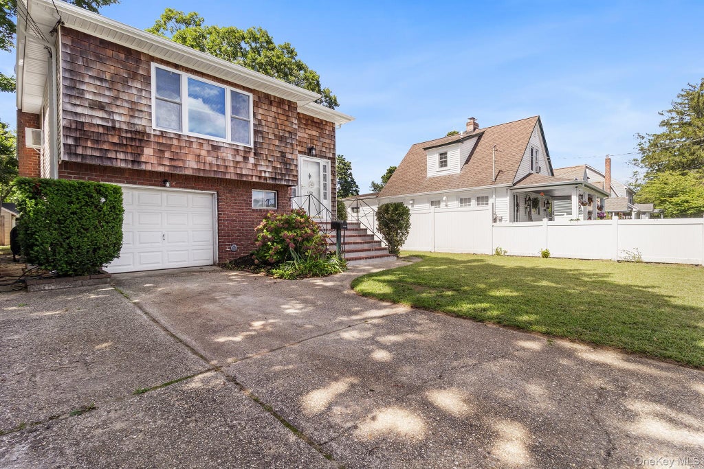 Photo of 1320 Pine Acres Boulevard, Bay Shore, NY 11706 (MLS # 1046243)