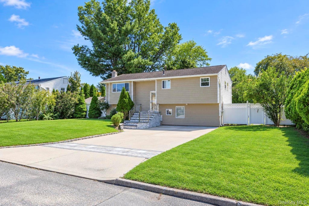 Photo of 16 Berkeley Avenue, Selden, NY 11784 (MLS # 1048999)