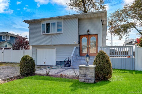Photo of 16 Ireland Place, Copiague, NY 11726 (MLS # 1065868)