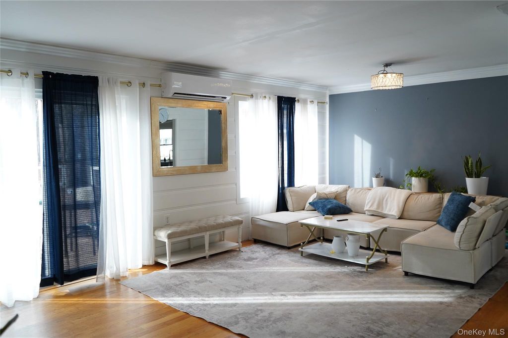 Photo of 4 Manor Hills Drive, Manorville, NY 11949 (MLS # 954411)