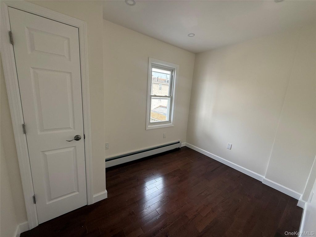 Photo of 9419 116th Street, Richmond Hill, NY 11419 (MLS # 986454)