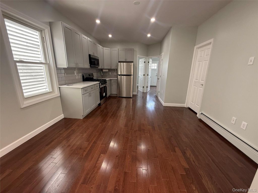 Photo of 9419 116th Street, Richmond Hill, NY 11419 (MLS # 986454)