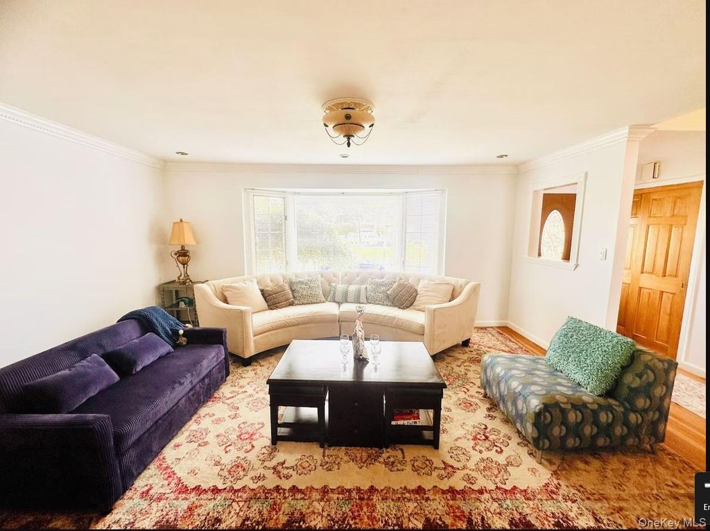 Photo of 310 Southwood Circle, Syosset, NY 11791 (MLS # 988247)