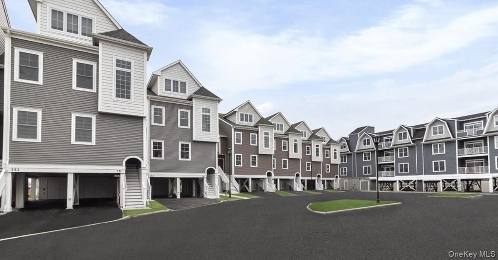 Photo of 121 Marina Pointe Drive #121, East Rockaway, NY 11518 (MLS # 946618)