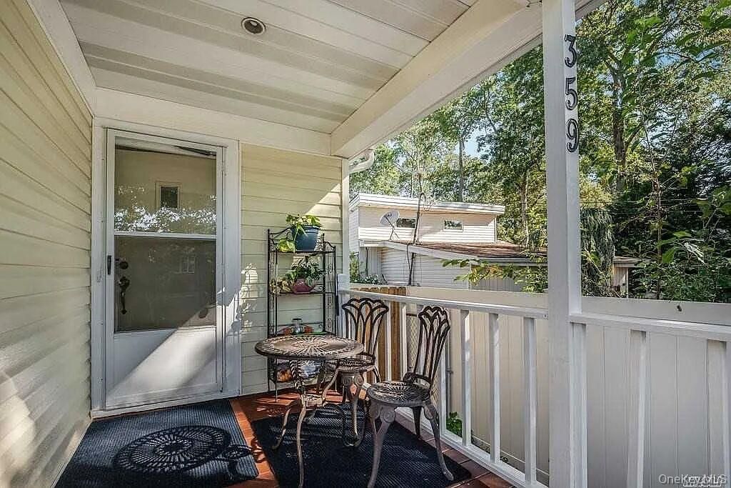 Photo of 359 Erlanger Blvd Blvd, North Babylon, NY 11703 (MLS # 953269)