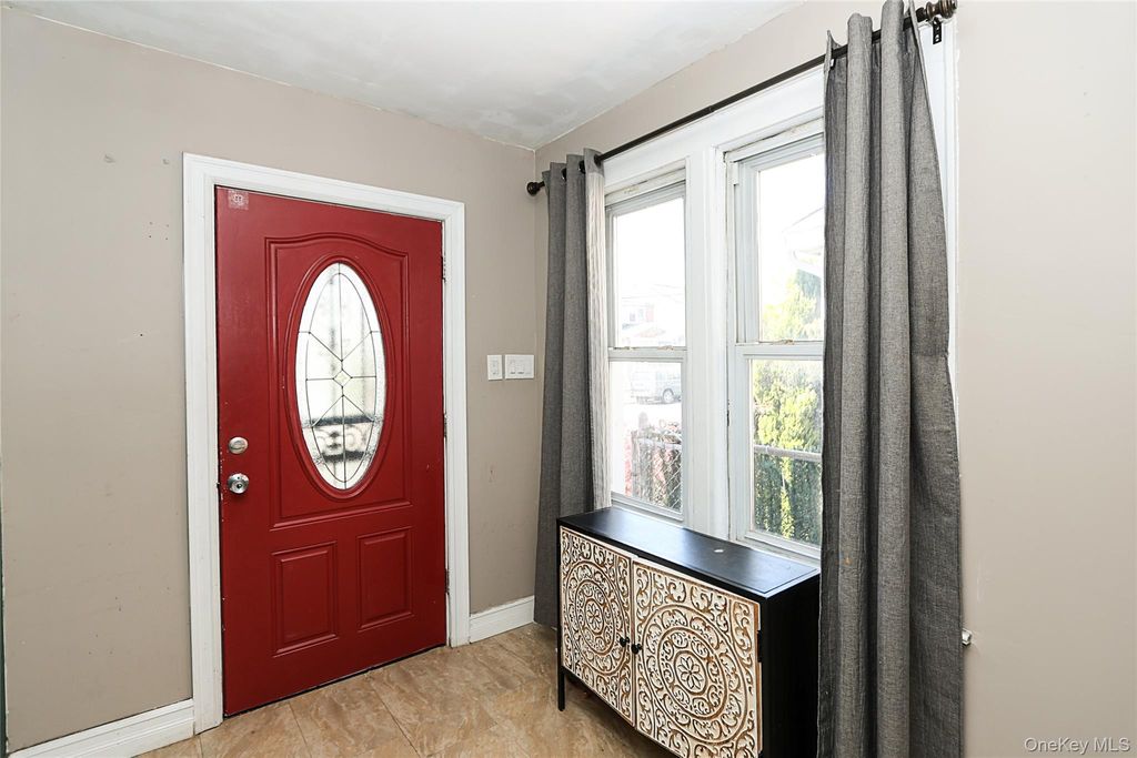 Photo of 89-47 212th Street, Queens Village, NY 11427 (MLS # 988677)
