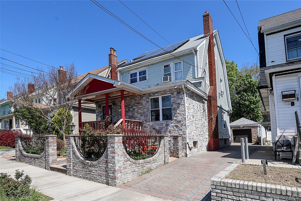 Photo of 89-47 212th Street, Queens Village, NY 11427 (MLS # 988677)