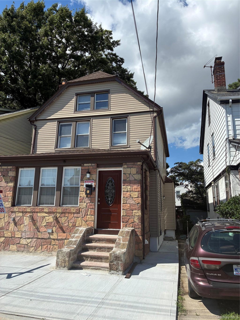 Photo of 205-15 111TH AVE Ave, Saint Albans, NY 11412 (MLS # 1040635)