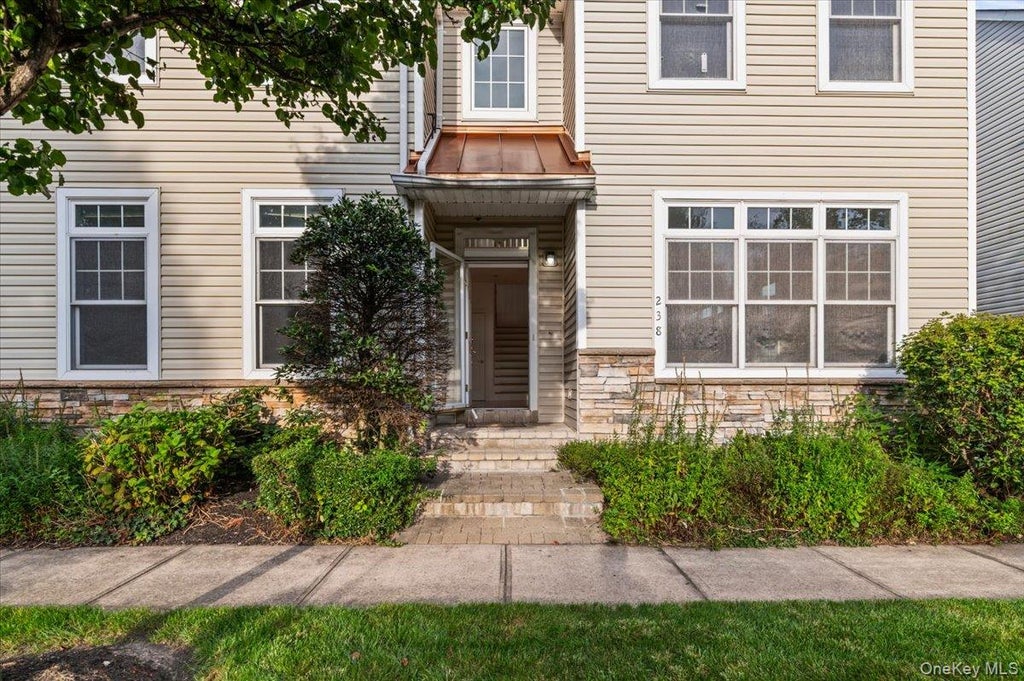 Photo of 238 Harbor View Drive #238, Port Washington, NY 11050 (MLS # 1049287)