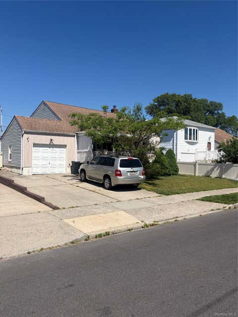 Photo of 70 Parma Road, Island Park, NY 11558 (MLS # 1009648)