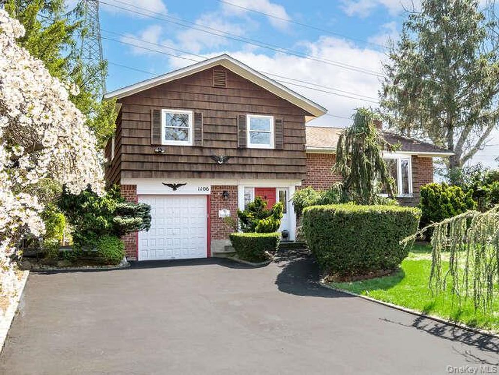 Photo of 1106 Glen Cove Avenue, Glen Head, NY 11545 (MLS # 986756)