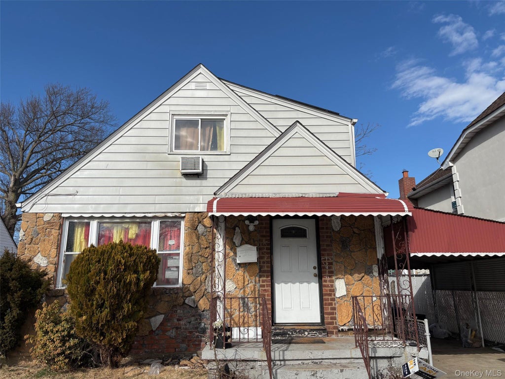 Photo of 231-37 128 Road, Laurelton, NY 11413 (MLS # 1052637)